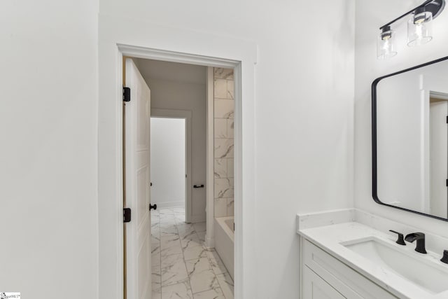 full bathroom featuring marble finish floor, shower / bath combination, and vanity