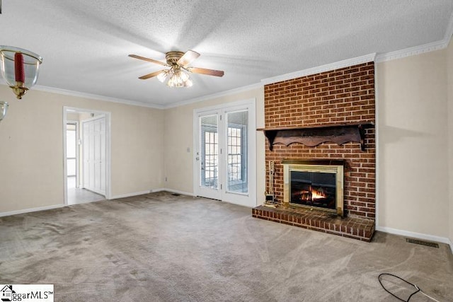 unfurnished living room featuring visible vents, crown molding, and carpet flooring