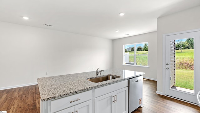 106 Sunriff Ct, Greer, SC 29651 - kitchen with stainless steel dishwasher, light stone counters, white cabinetry, dark wood finished floors, and recessed lighting