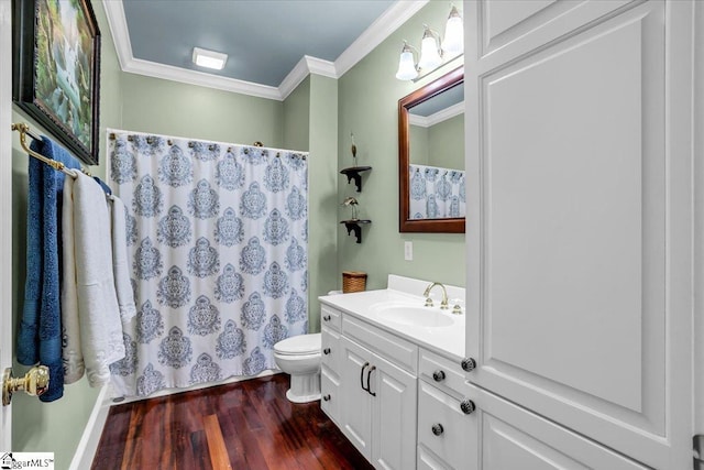 full bath featuring toilet, a shower with curtain, ornamental molding, wood finished floors, and vanity