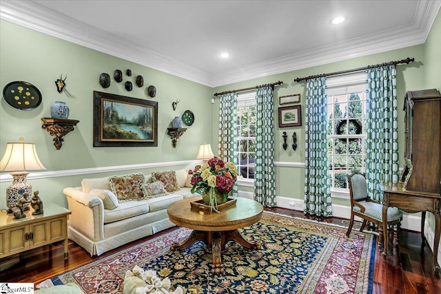 living room with dark wood-style floors, ornamental molding, recessed lighting, and baseboards