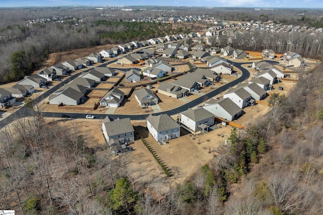 birds eye view of property with a residential view