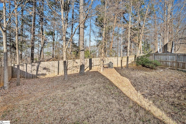 view of yard featuring a fenced backyard