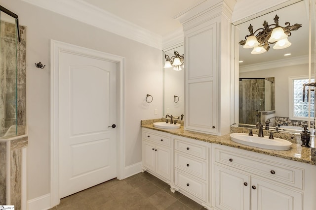 bathroom featuring double vanity, a stall shower, a sink, and crown molding