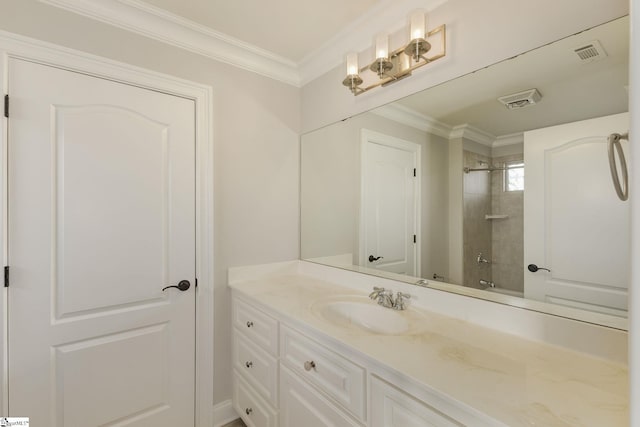 bathroom with  shower combination, visible vents, crown molding, and vanity