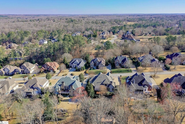 birds eye view of property with a residential view