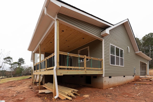 view of home's exterior featuring crawl space