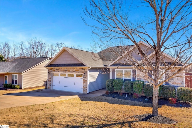 craftsman inspired home with a shingled roof, stone siding, an attached garage, and concrete driveway