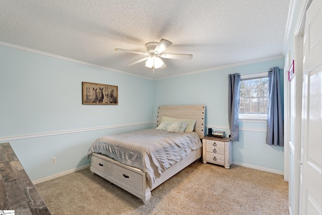 bedroom with light carpet, a textured ceiling, and baseboards