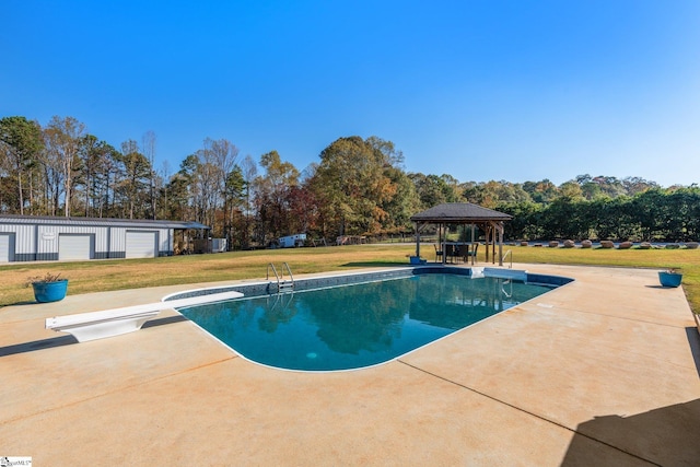 outdoor pool with a diving board, a gazebo, and a lawn