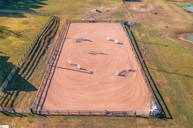 drone / aerial view with a rural view and a water view