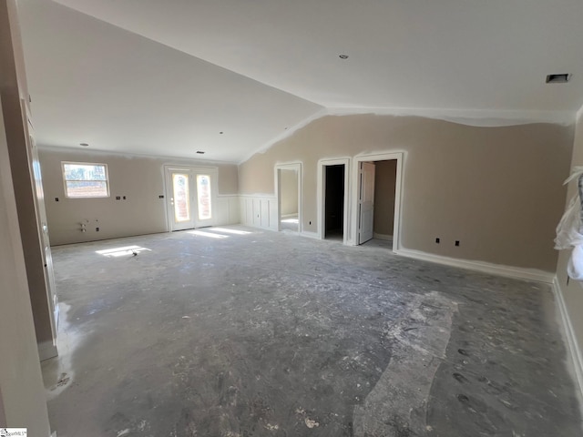 empty room with vaulted ceiling