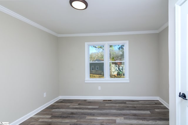 unfurnished room featuring crown molding, baseboards, and dark wood-type flooring