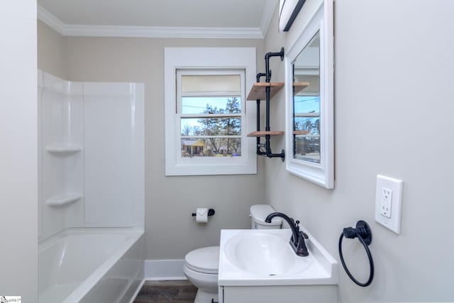 bathroom with shower / bathtub combination, toilet, wood finished floors, baseboards, and ornamental molding