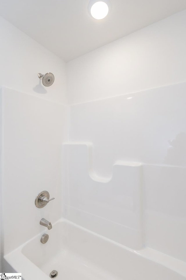 bathroom featuring tub / shower combination