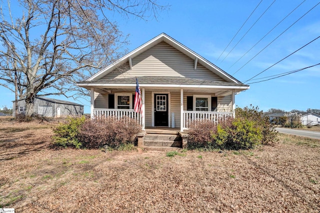 bungalow-style house featuring covered porch