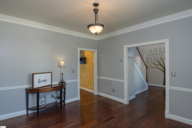 interior space with visible vents, baseboards, stairs, dark wood-style floors, and crown molding