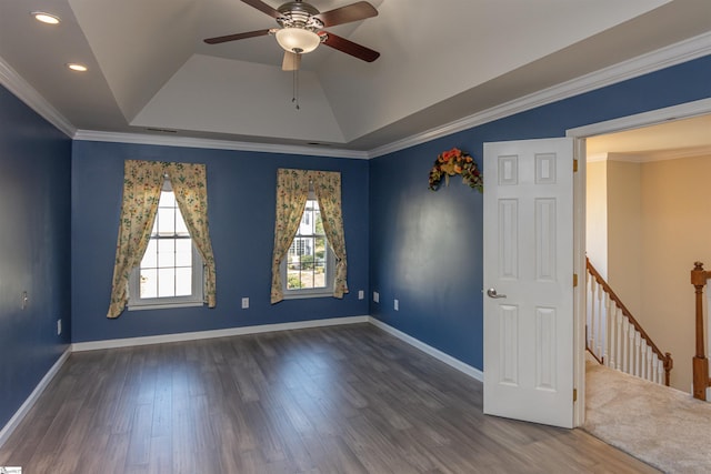 unfurnished room featuring dark wood-style floors, baseboards, and crown molding