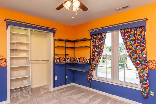 bedroom featuring carpet, visible vents, ceiling fan, and baseboards