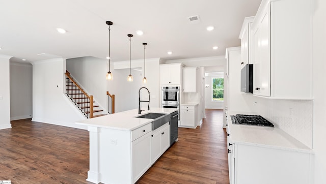 400 Fiery Rd Lot 0173, Mauldin, SC 29607 - kitchen featuring a sink, stainless steel gas cooktop, dishwashing machine, ornamental molding, and dark wood-type flooring
