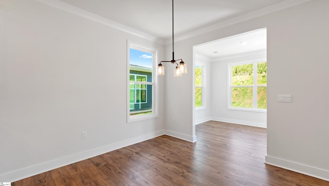 400 Fiery Rd Lot 0173, Mauldin, SC 29607 - unfurnished dining area with healthy amount of natural light, baseboards, dark wood-style floors, ornamental molding, and a chandelier