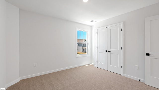 400 Fiery Rd Lot 0173, Mauldin, SC 29607 - unfurnished bedroom with carpet, baseboards, and a closet