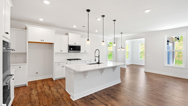 400 Fiery Rd Lot 0173, Mauldin, SC 29607 - kitchen featuring a sink, stainless steel microwave, backsplash, baseboards, and recessed lighting