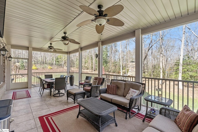 sunroom / solarium featuring a wealth of natural light