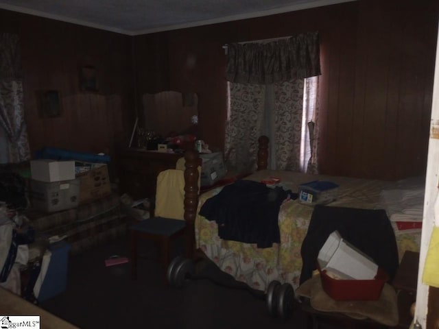 bedroom featuring crown molding