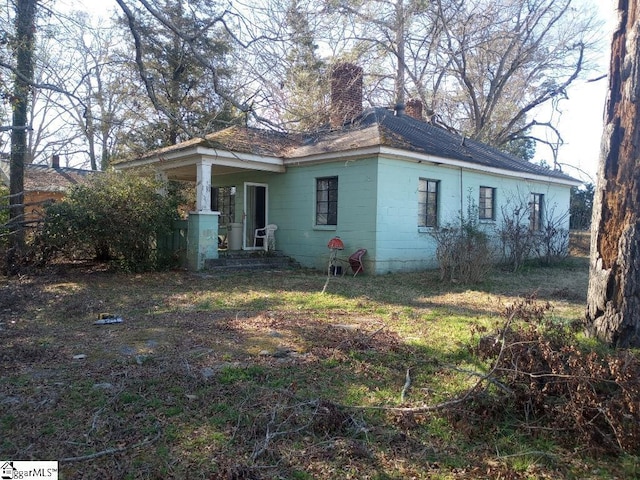 exterior space with a chimney