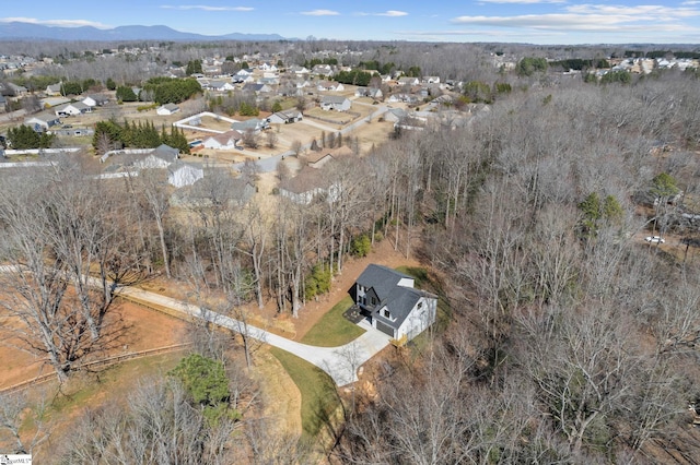 bird's eye view featuring a residential view and a mountain view