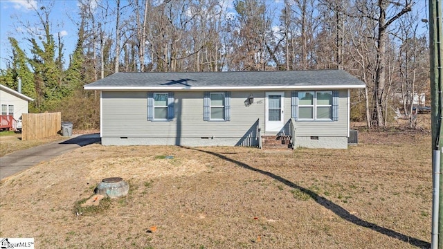 view of front of home with crawl space, a front yard, and entry steps