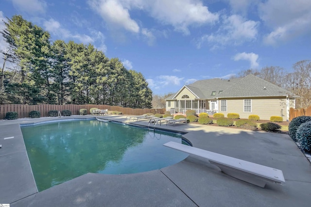 view of pool featuring a patio area, a fenced backyard, and a fenced in pool