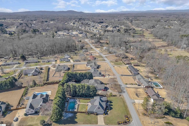 drone / aerial view featuring a mountain view and a residential view