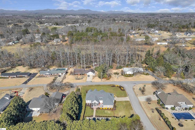 drone / aerial view with a residential view and a mountain view