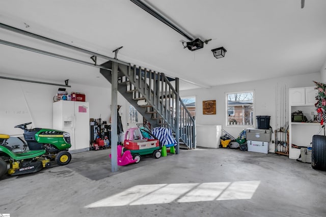 garage featuring a garage door opener