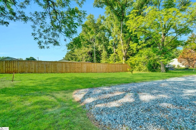 view of yard featuring fence