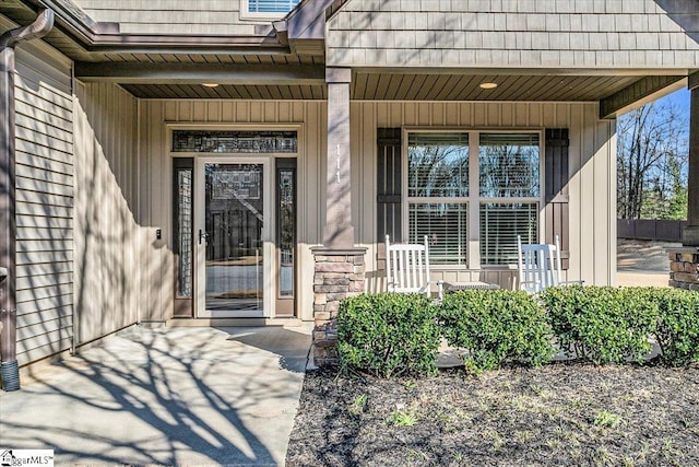 property entrance featuring covered porch