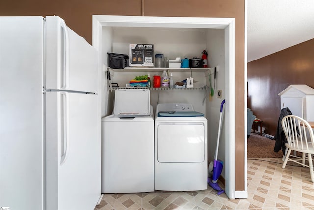 clothes washing area with laundry area and separate washer and dryer