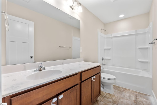 full bathroom featuring toilet, bathtub / shower combination, and vanity