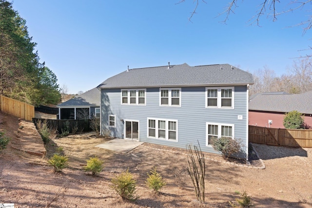 back of house with a patio area and a fenced backyard