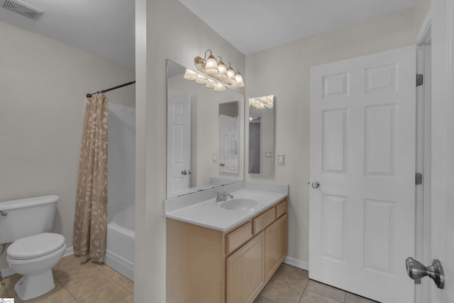 bathroom featuring tile patterned flooring, toilet, vanity, visible vents, and shower / bath combo