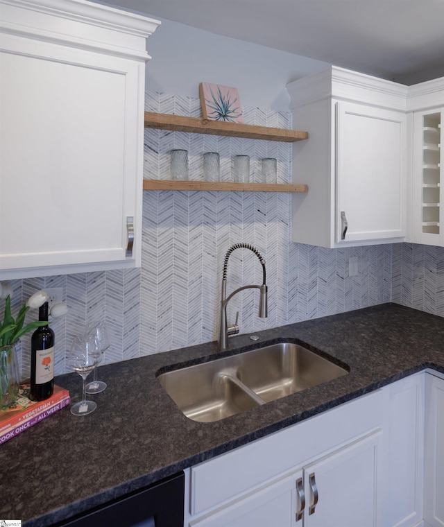 kitchen featuring white cabinetry, open shelves, and a sink