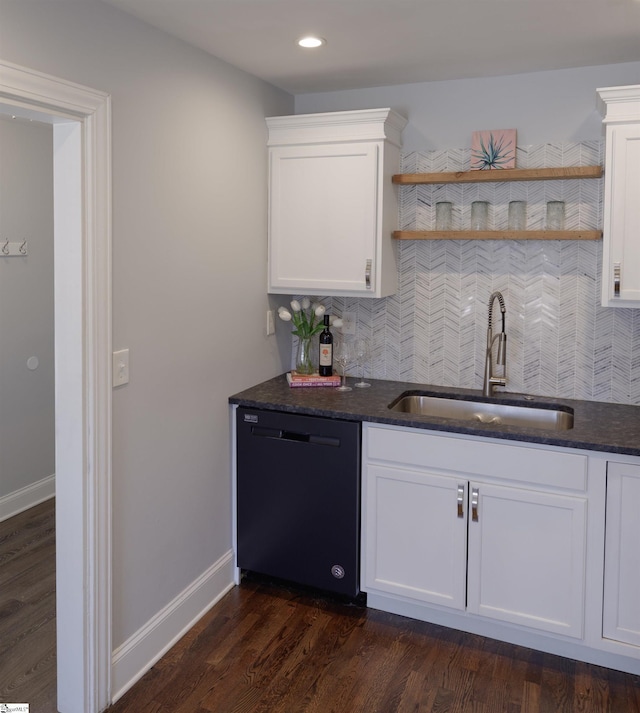 kitchen featuring a sink, white cabinetry, dishwasher, open shelves, and tasteful backsplash