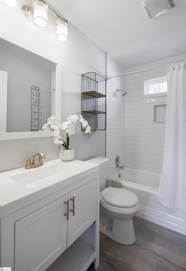 full bathroom featuring toilet, shower / tub combo, vanity, and visible vents