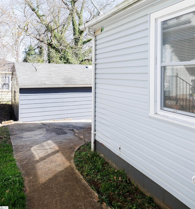 view of side of home featuring a patio area