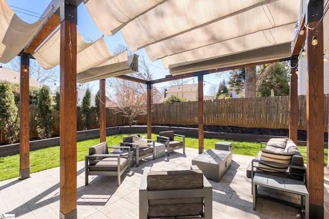 view of patio featuring an outdoor hangout area and a fenced backyard