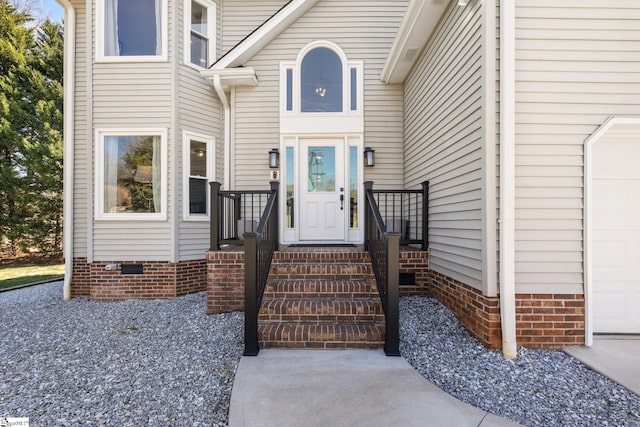 view of exterior entry with crawl space