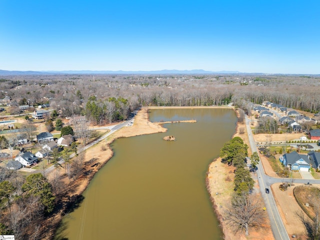 birds eye view of property with a water view and a residential view