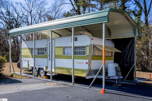 519 Spring Rd, Laurens, SC 29360 - exterior space with a detached carport